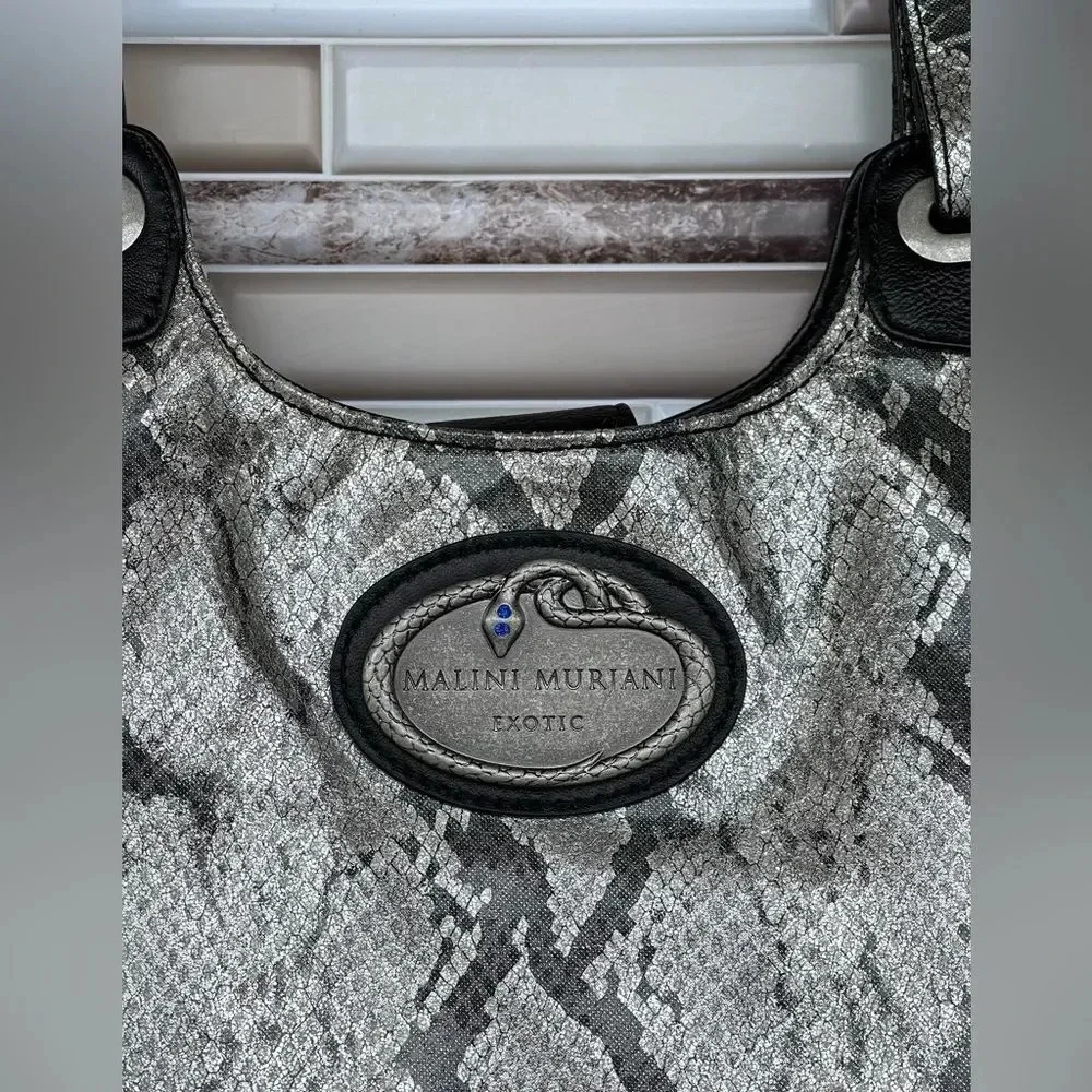 Malini Murjani Exotic snake tote